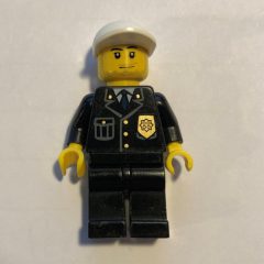 Minifigurka LEGO Policeman, Black Suit with Badge, White Cap, Stubble
