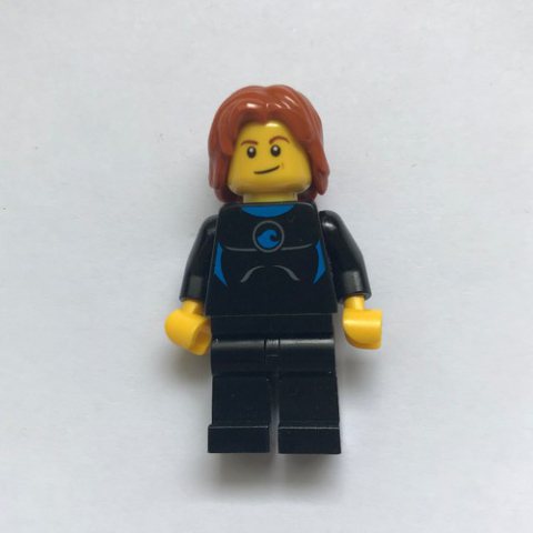 Minifigurka LEGO Man, Black Wetsuit, Mid-Length Dark Orange Hair