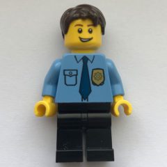 Minifigurka LEGO Policeman, Medium Blue Shirt with Badge and Tie, Black Legs, Dark Brown Hair