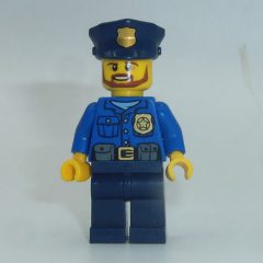 Minifigurka LEGO Policeman, Blue Shirt with Badge and Pouches, Dark Blue Legs, Dark Blue Police Hat with Badge, Beard