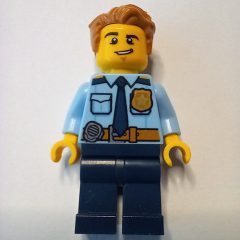 Minifigurka LEGO Policeman, Bright Light Blue Shirt with Dark Blue Tie, Badge, and Radio on Belt, Medium Nougat Hair