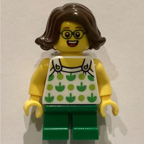 Minifigurka LEGO Kid - White Torso, Green Legs, Dark Brown Hair
