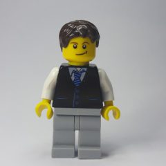 Minifigurka LEGO Man, Black Vest and Tie, Light Bluish Gray Legs, Dark Brown Hair