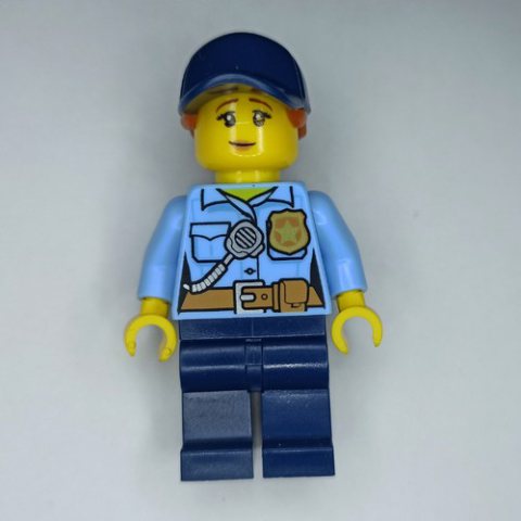 Minifigurka LEGO Policewoman, Bright Light Blue Shirt, Dark Blue Legs, Dark Blue Cap with Ponytail