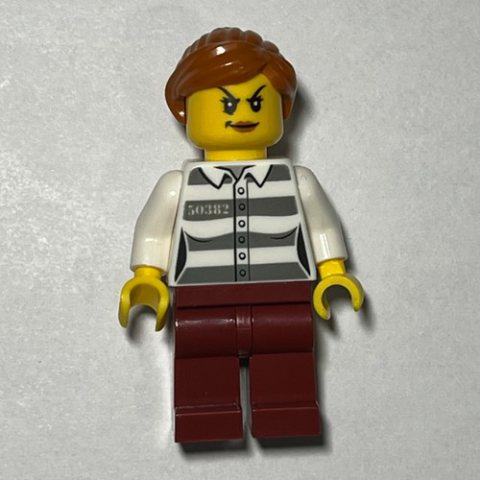 Minifigurka LEGO Criminal, Woman, Prison Shirt with '50382', Dark Red Legs, Dark Orange Hair